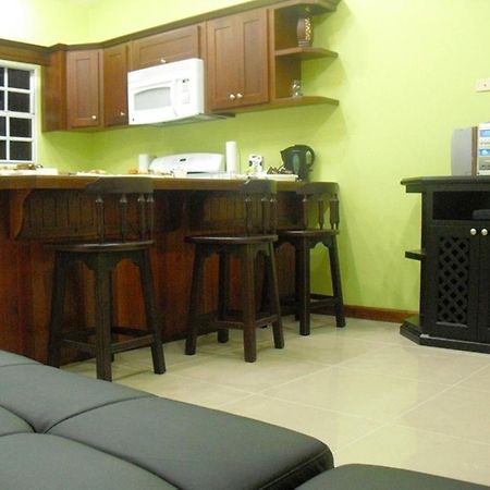 Piarco Village Suites Bagian luar foto