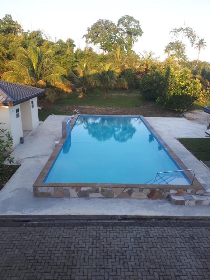 Piarco Village Suites Bagian luar foto