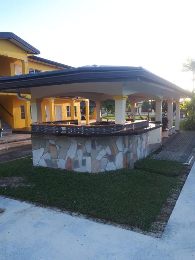 Piarco Village Suites Bagian luar foto