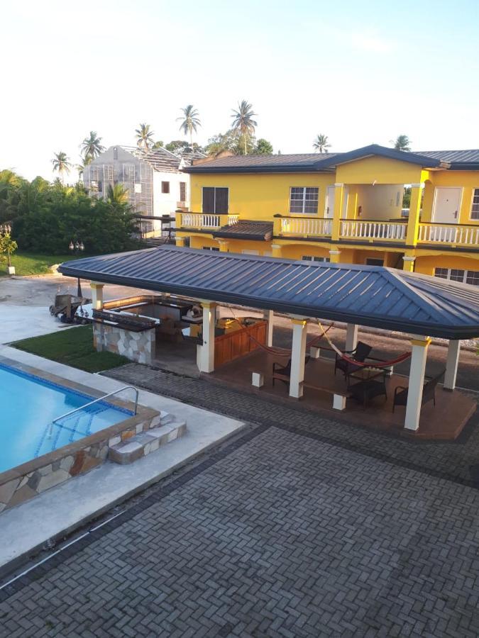 Piarco Village Suites Bagian luar foto