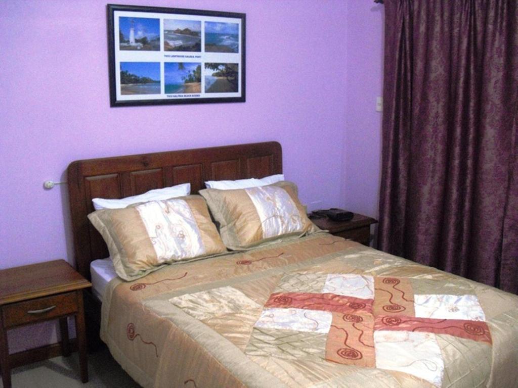 Piarco Village Suites Bagian luar foto
