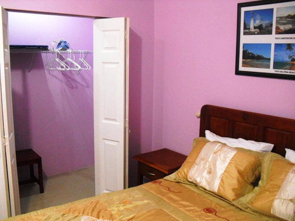 Piarco Village Suites Bagian luar foto