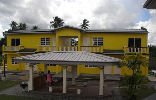 Piarco Village Suites Bagian luar foto