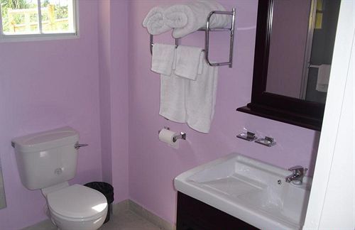Piarco Village Suites Bagian luar foto