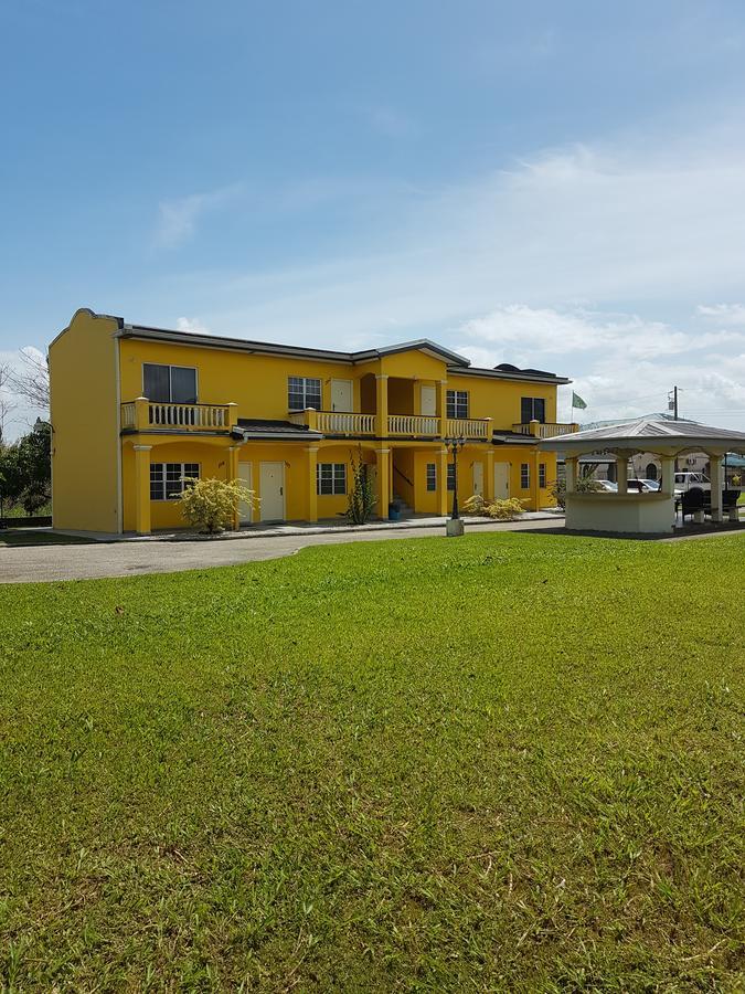 Piarco Village Suites Bagian luar foto