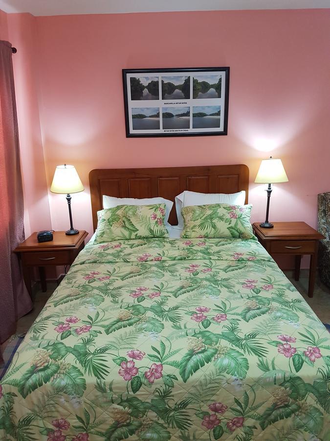 Piarco Village Suites Bagian luar foto