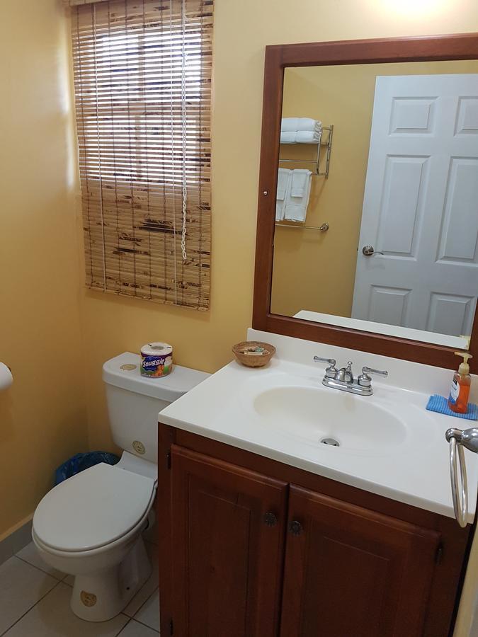 Piarco Village Suites Bagian luar foto