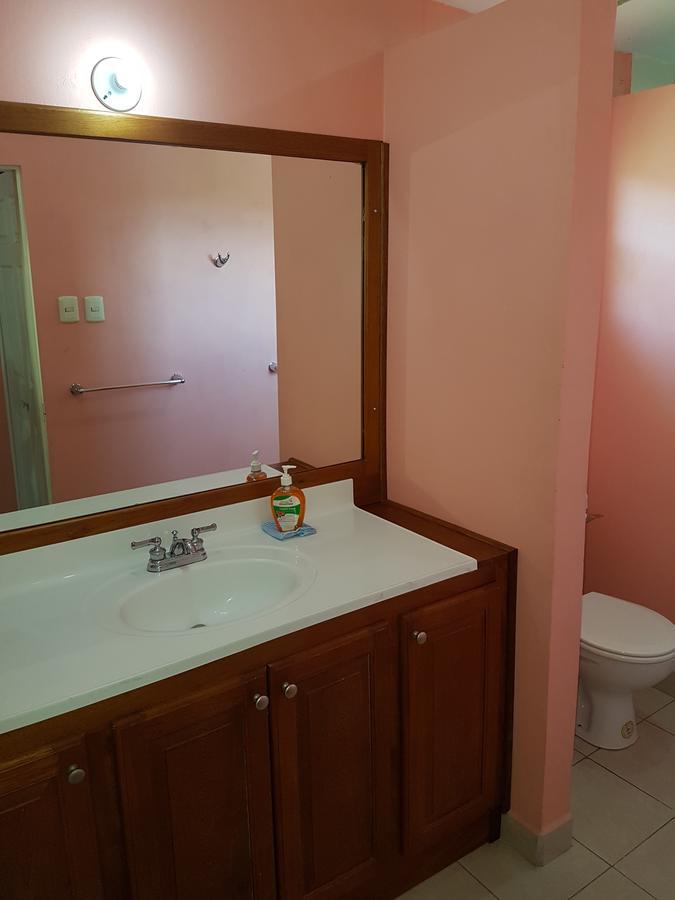Piarco Village Suites Bagian luar foto
